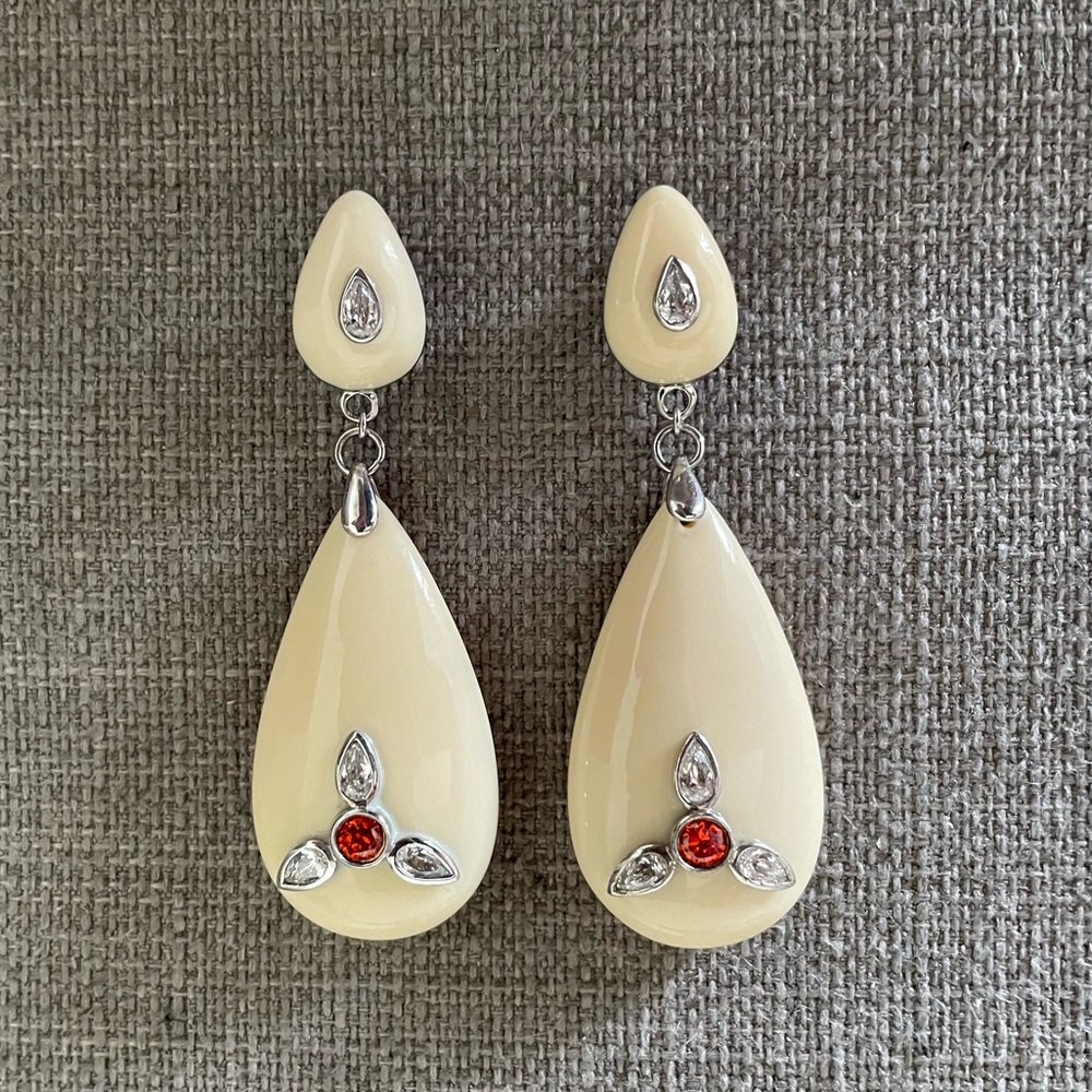 Mirim Silver Cream Resin Tear Dangle
Earrings with red clear Swarovski crystals